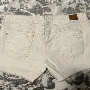 American Eagle white denim cut off shorts